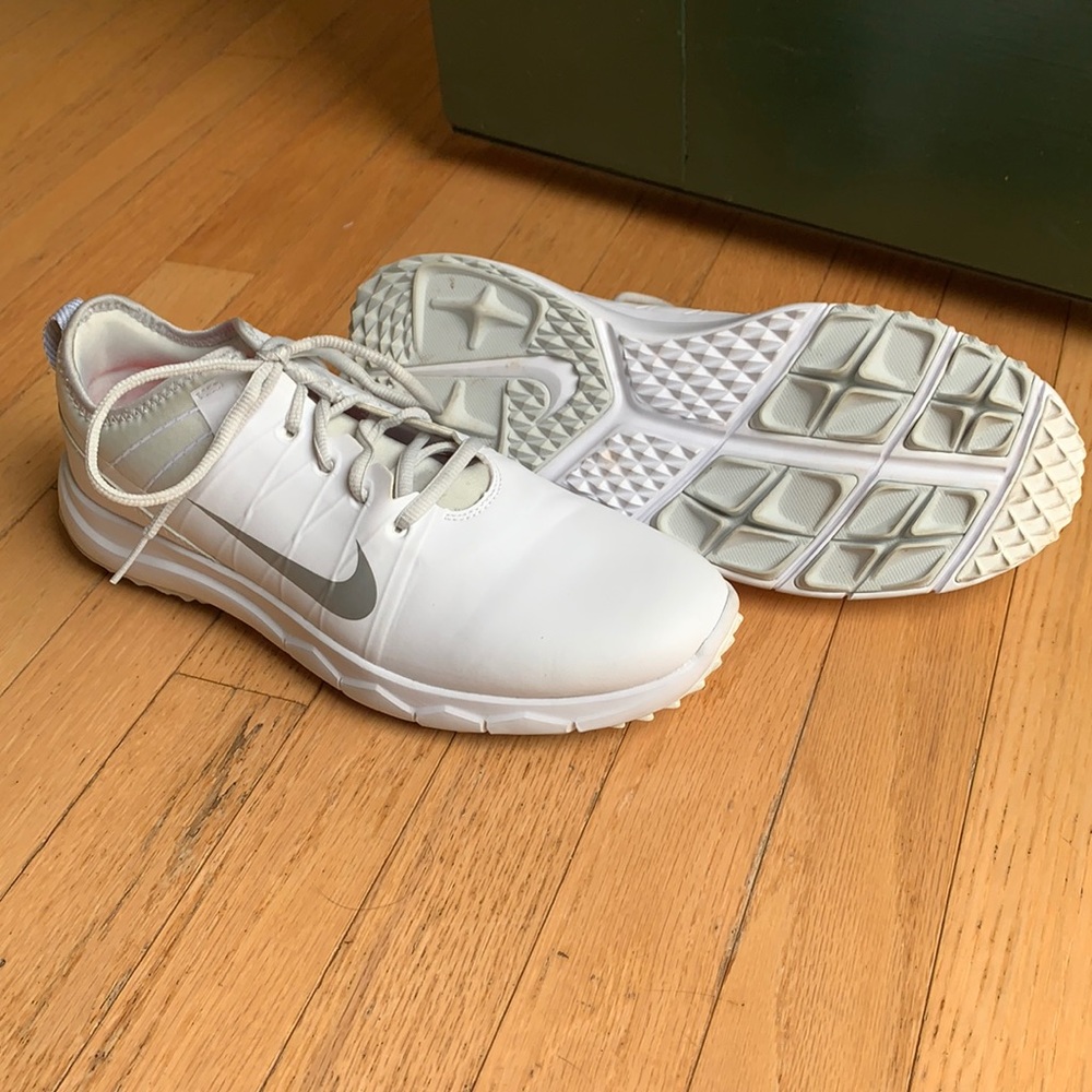 Women’s white Nike golf sneakers